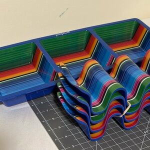 Prepare melamine taco set. Topping tray and taco holders. Read